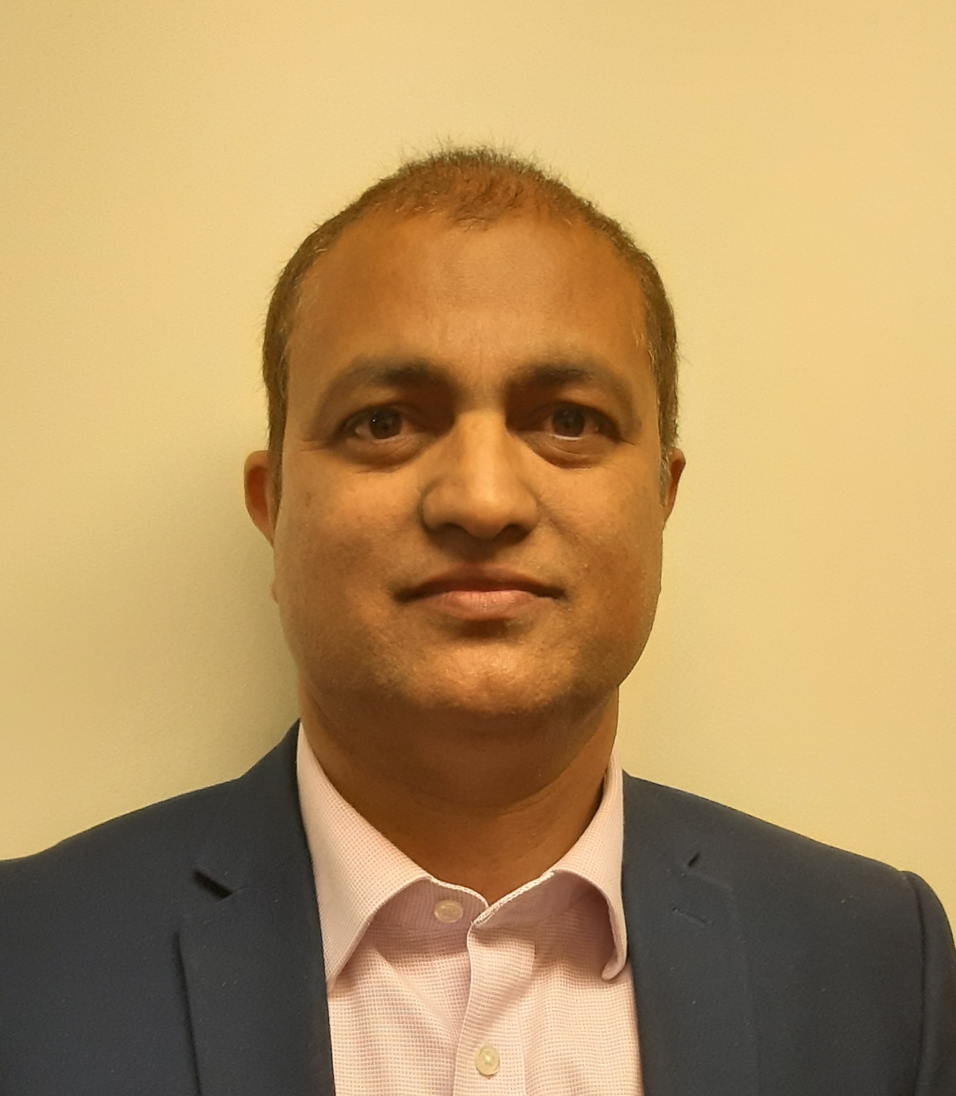 Dr Manzoor Malik, a member of staff at Lochthorn Medical Centre.